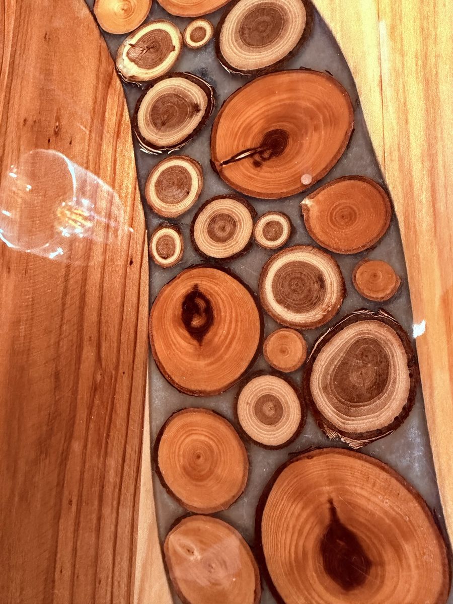 Handmade Live Edge Wood Resin Coffee Table with Inlaid Wood Slices and two matching end tables. 