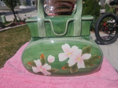 Vintage ceramic basket-style pottery piece with ha
