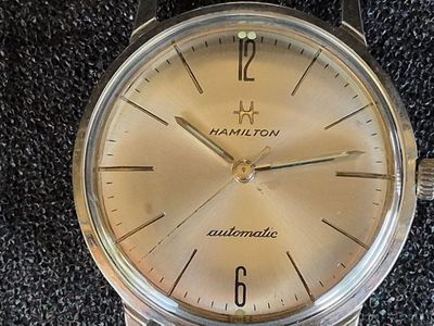I’m selling a used vintage HAMILTON auto wind wristwatch in a stainless-steel case.