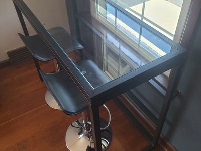 Modern Console Bar Table with Glass Top & Black Metal Frame - Two Black Bar Stools Included