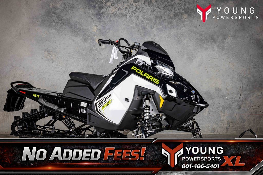 2026 Polaris® 850 RMK SP 155 White Lightning / Gloss Black / Neon