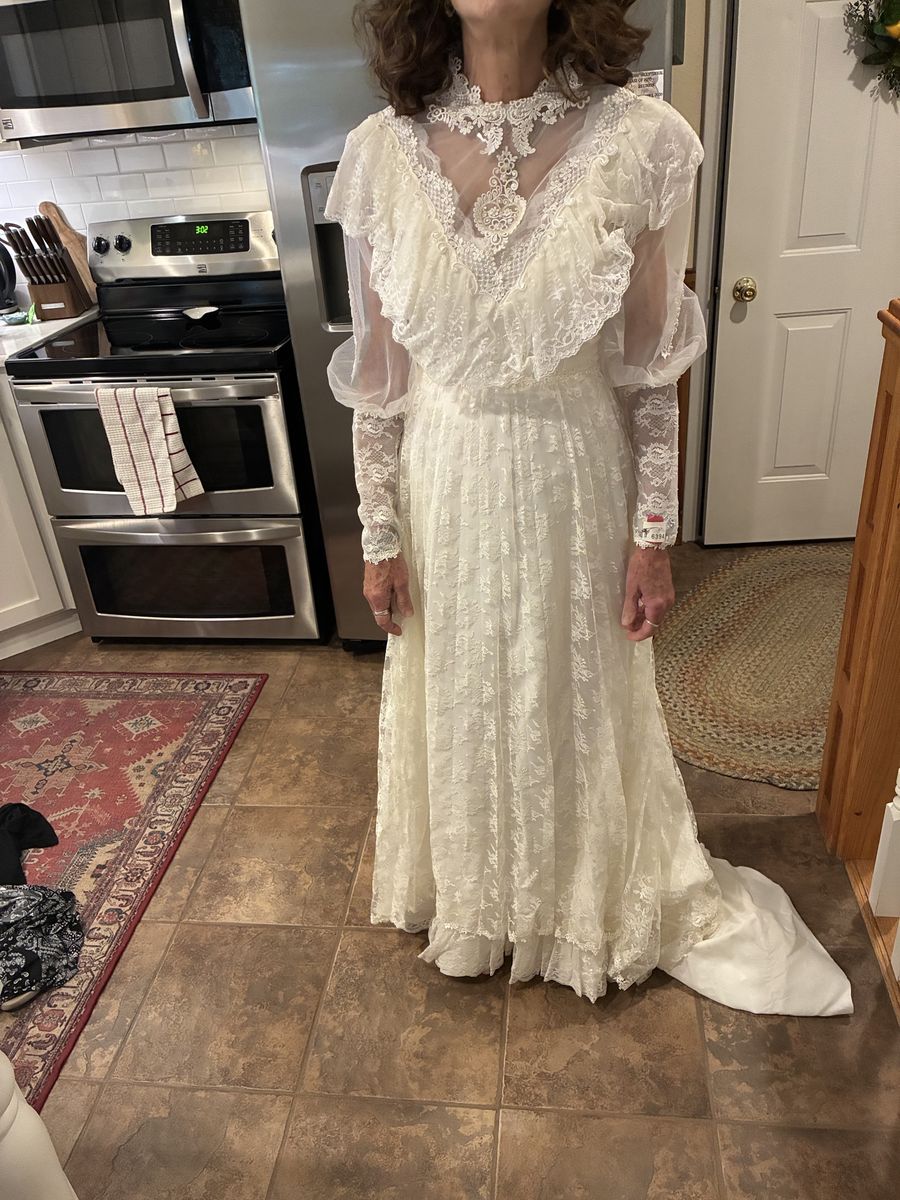 Vintage Long-Sleeve Lace Wedding Dress with High Neck and long Train