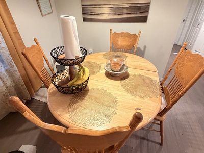 Classic Light Wood Pedestal Dining Table with 4 Carved Wooden Chairs - Extendable Leaf Included