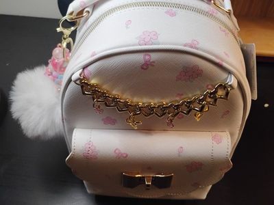 UNDERONESKY White Mini Backpack with Pink Cherry Blossom & Ribbon Print, Gold Chain Detail, & Pom Charm