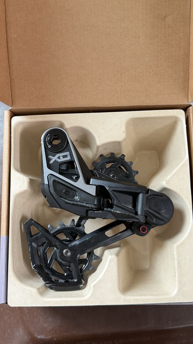 SRAM XO rear derailleur and cassette.