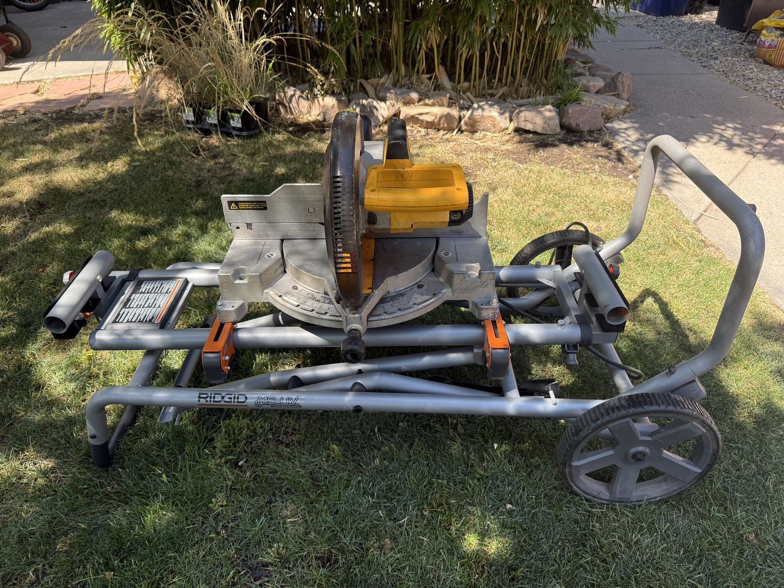 DeWalt 12" Compound Miter Saw with RIDGID Collapsible Mobile Utility Stand