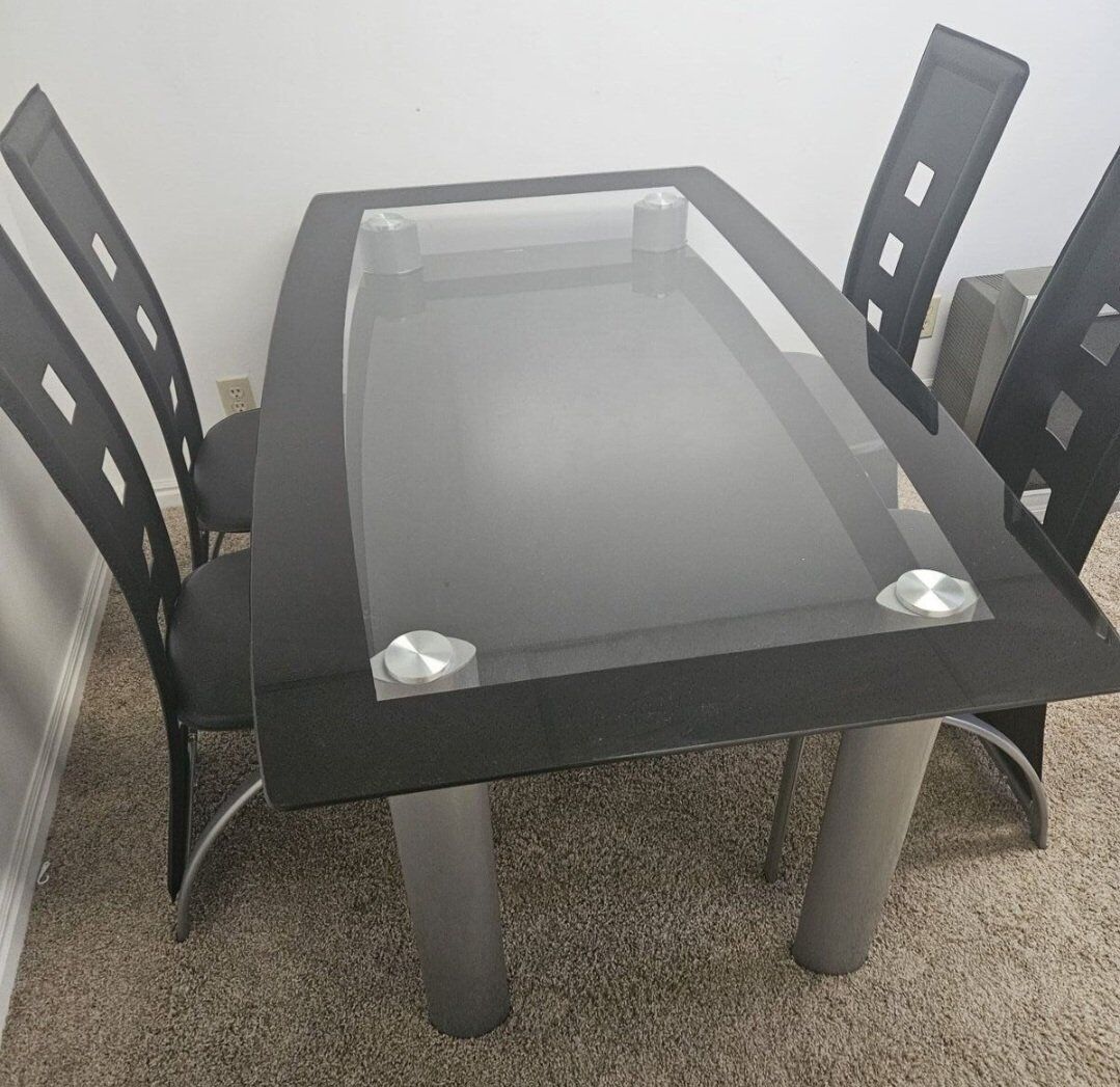 Glass dining table with 4 chairs