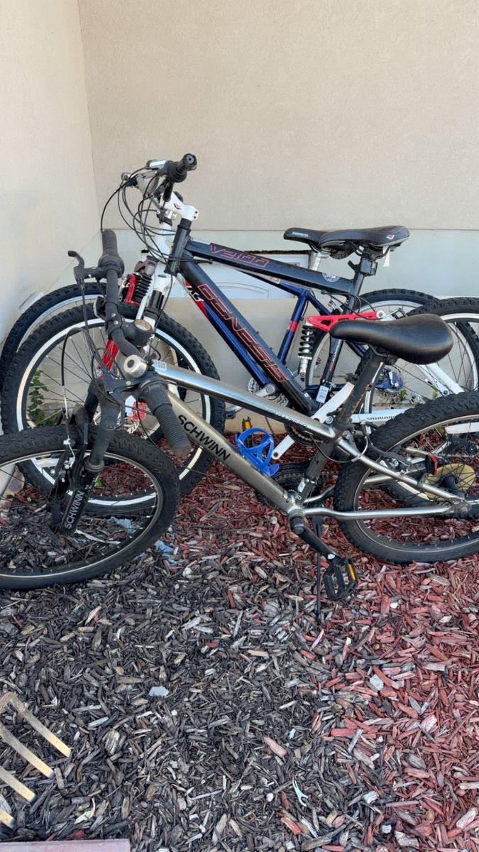 Schwinn Ranger 24" Kids Mountain Bike & Genesis V2100 Adult Mountain Bike (26"?) - Pair bikes are new. Only used for six months.
