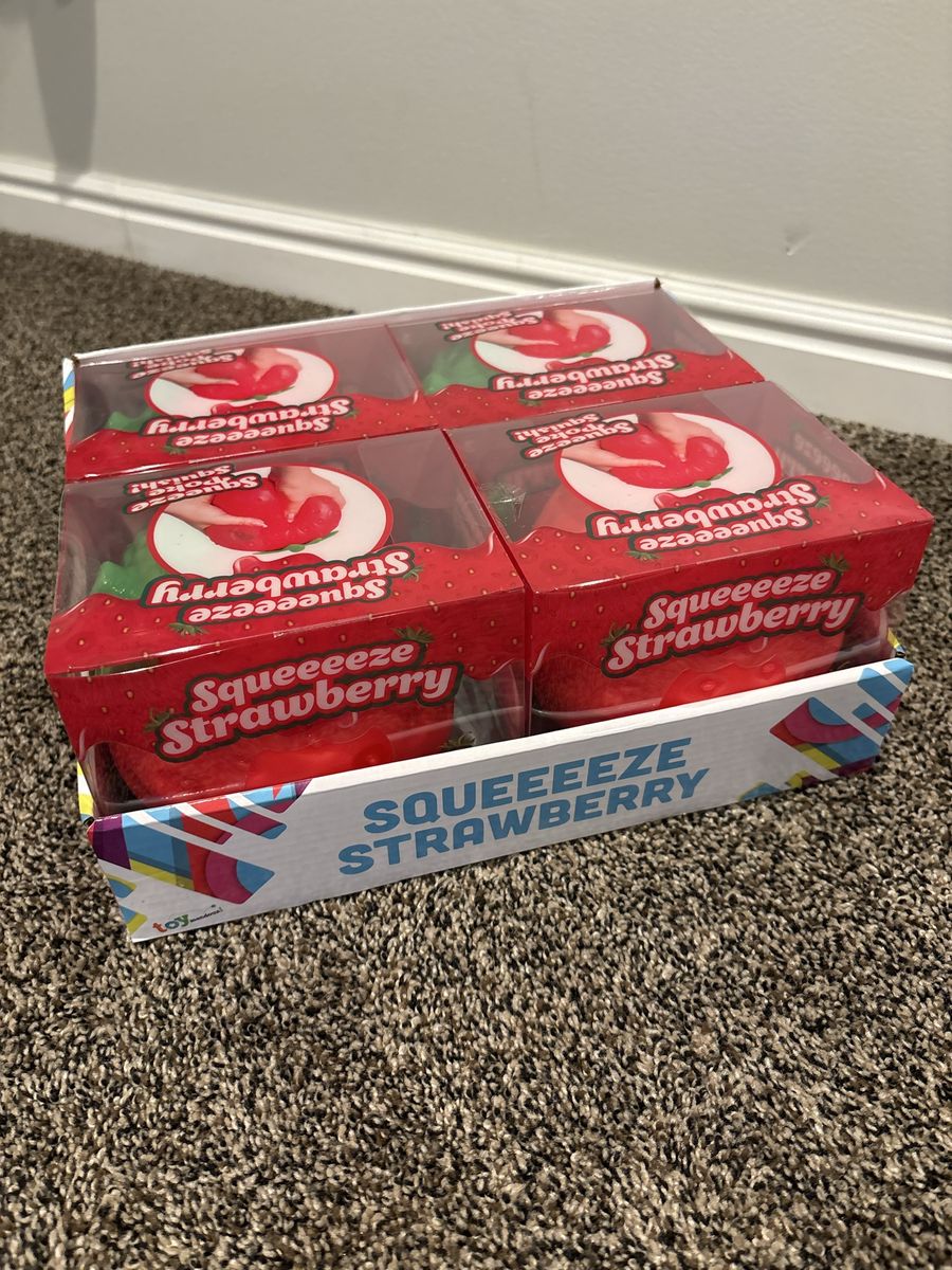  Squeeeeze Strawberry Squishy Stress Relief  12$ EACH 