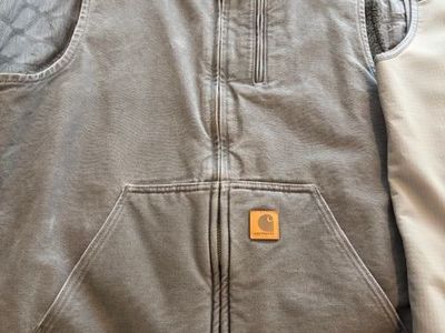 Carhartt vests, like new $30 each or 2 for $50