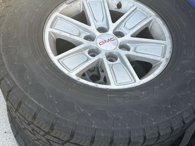 GMC OEM Silver Alloy Wheels with Big O Big Foot A/T Tires + steel rim spare new