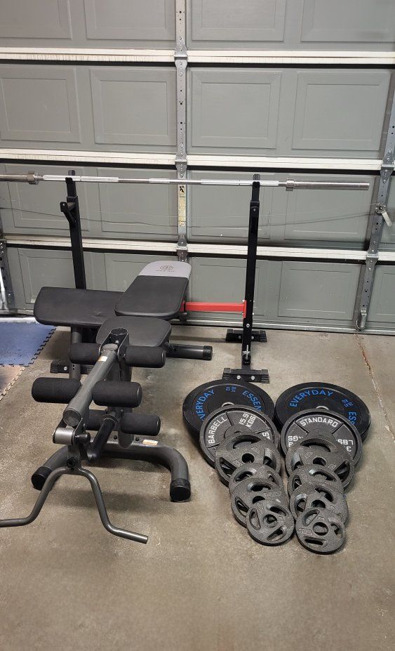 Bench and 260 pounds of weights
