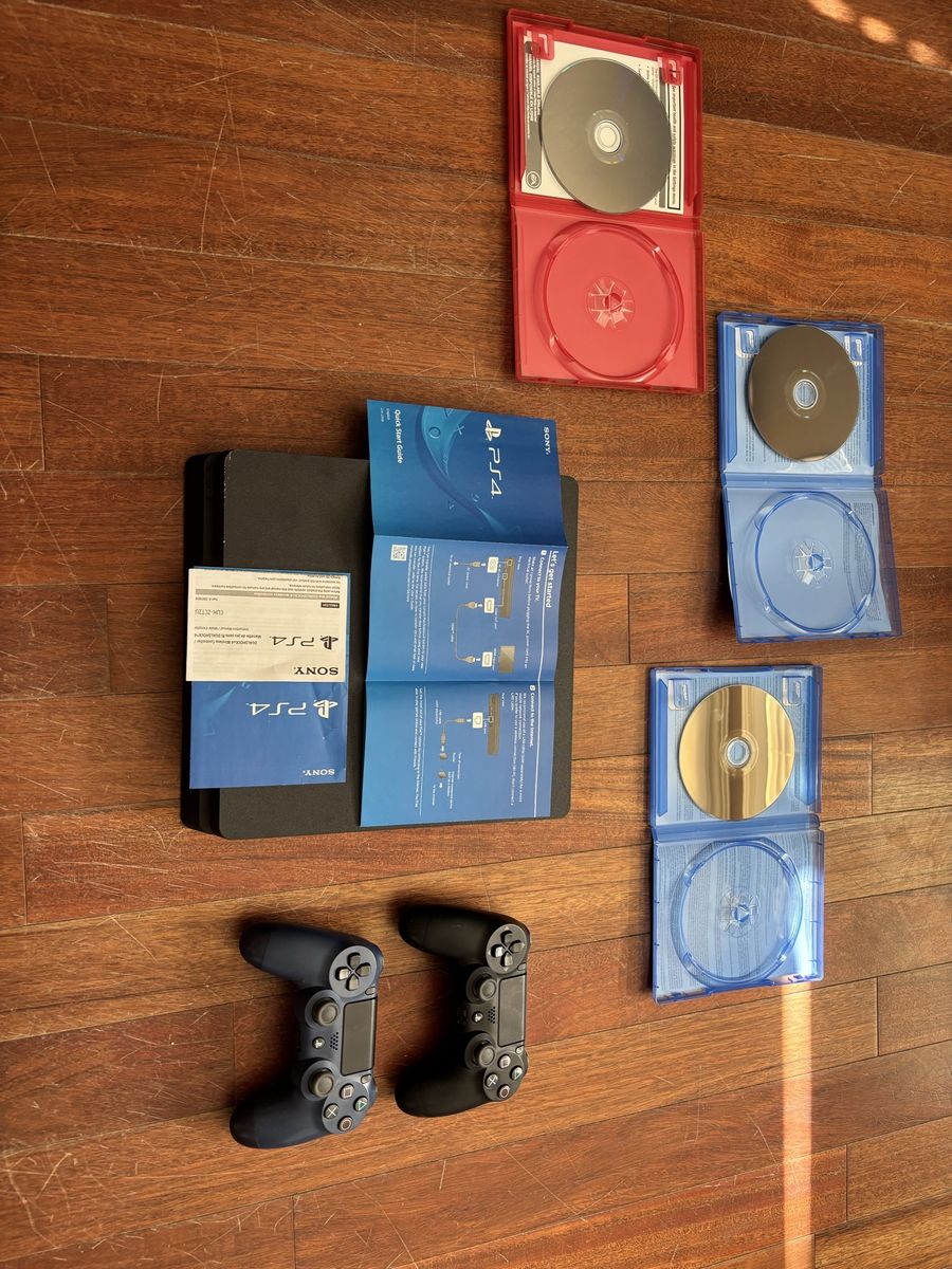 $125 OBO Sony PlayStation 4 Slim Console Bundle with 2 DualShock Controllers & 3 Games