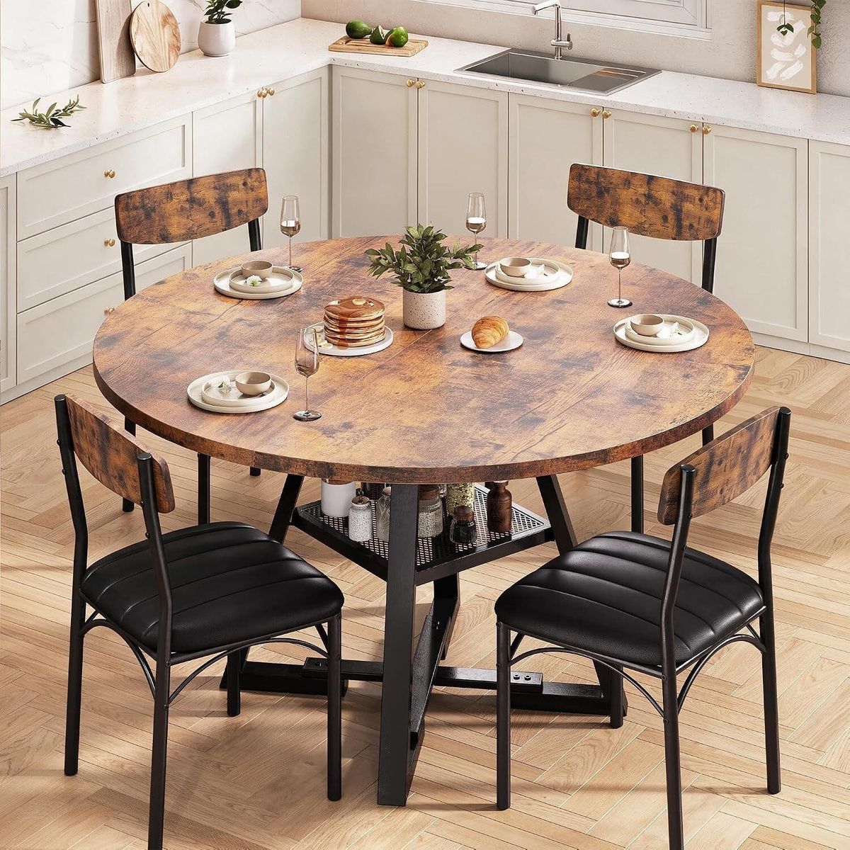 Rustic dining set includes a round table and four chairs the table has a wood grain finish