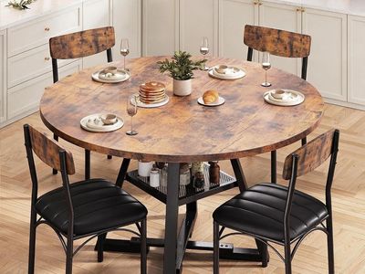 Rustic dining set includes a round table and four chairs the table has a wood grain finish