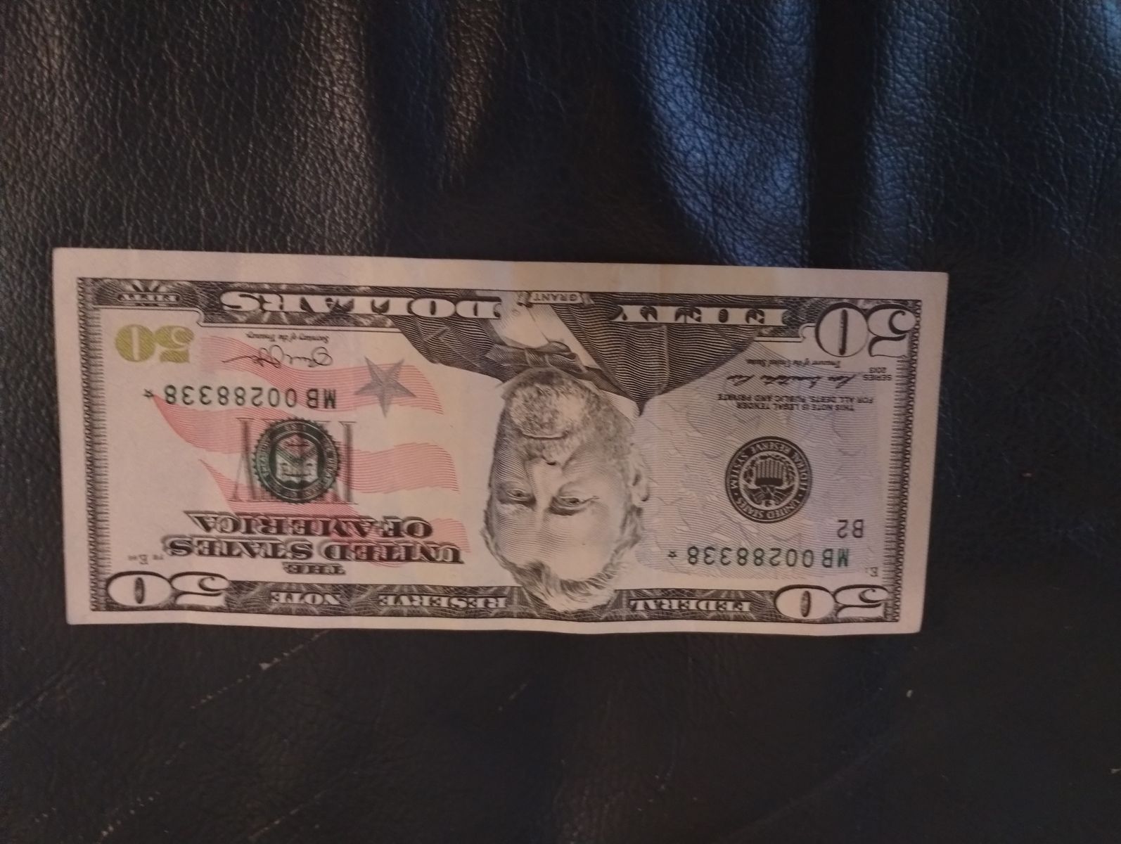 Fifty Dollar Star Note U.S. currency.
