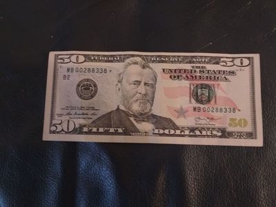 Fifty Dollar Star Note U.S. currency.