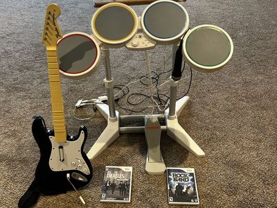 Nintendo Wii Rock Band Bundle - Drum Kit, Fender Stratocaster Guitar, Microphone, and 2 Games