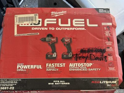 Milwaukee drill set with batteries- new