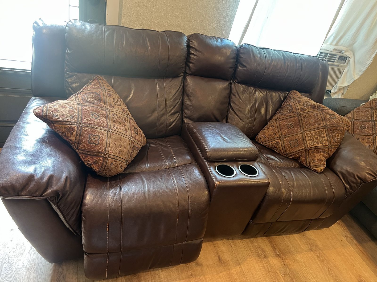 Brown Leather electric Recliner Loveseat with Console and Cupholders - Used, Minor Wear
