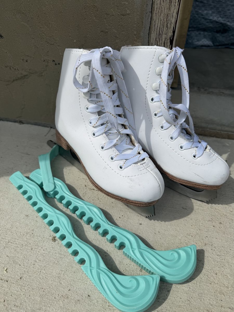 White Figure Skates with Teal Blade Guards