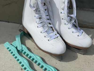 White Figure Skates with Teal Blade Guards