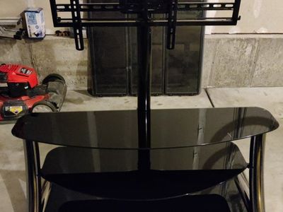 Glass TV stand with shelves