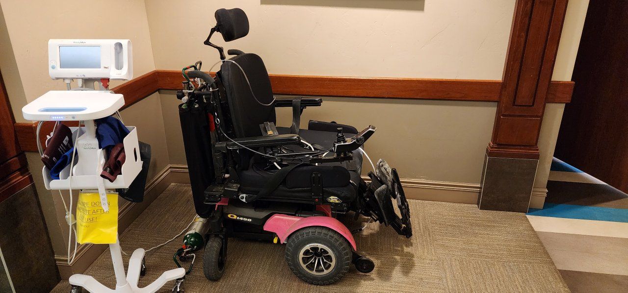 Quantum Q1450 Power Wheelchair - Heavy Duty Motorized Chair with Headrest amd battery for it