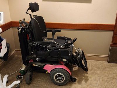 Quantum Q1450 Power Wheelchair - Heavy Duty Motorized Chair with Headrest amd battery for it