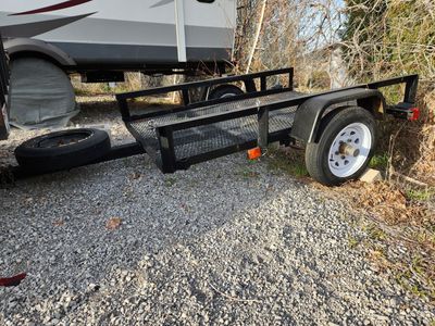 2 Dirt Bikes & Trailer