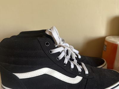 Women’s Size 10 Vans high tops.