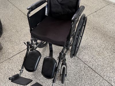 Drive Medical Cruiser III Manual Wheelchair with Elevating Leg Rests – $50