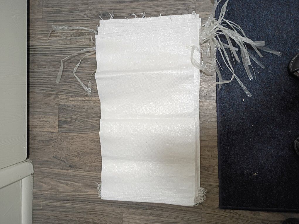 white plastic burlap bags (14"x26")
