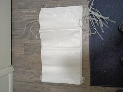 white plastic burlap bags (14"x26")