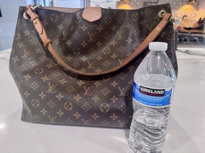 Authentic Louis Vuitton Delightful MM in the classic Monogram Canvas.