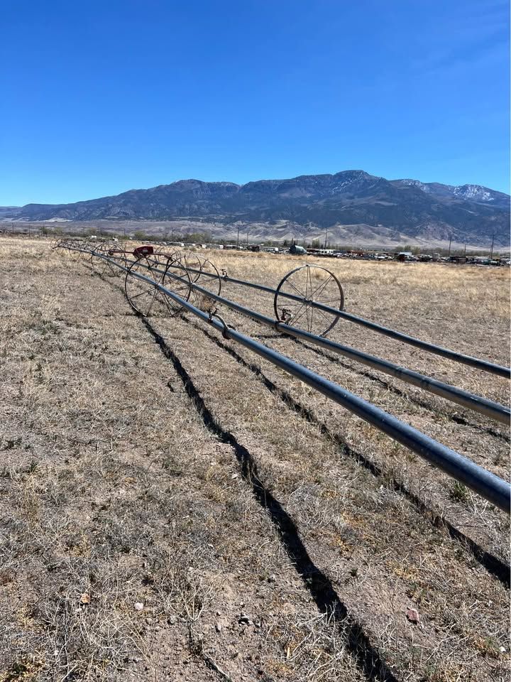 Sprinkler wheel line, mover, and pump for irrigation