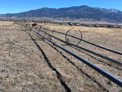 Sprinkler wheel line, mover, and pump for irrigation