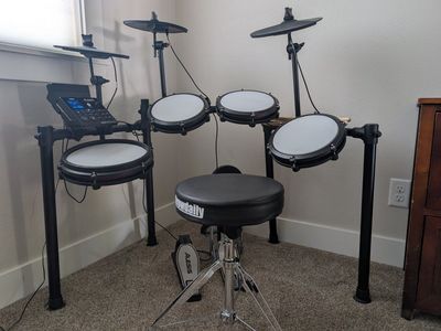 Alesis Nitro Max Electronic Drum Kit w/ Mesh Heads, Bluetooth, Stool & Headphones