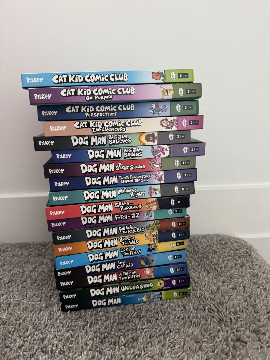 All Dog Man books and 4 cat kid books