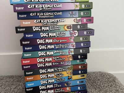 All Dog Man books and 4 cat kid books