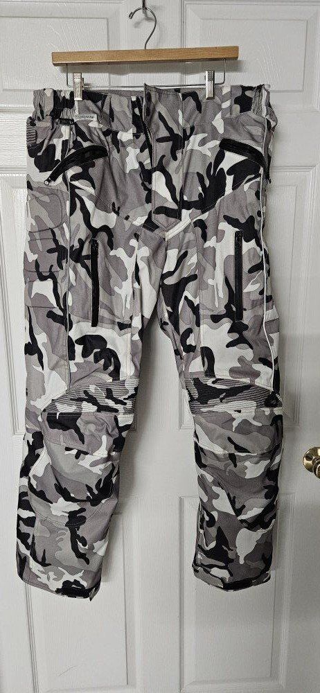 3 pairs of XL motorcycle pants.