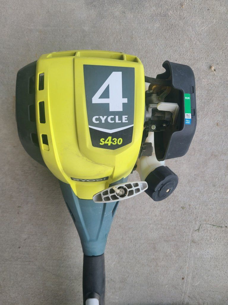Used Ryobi gas power head, with trimmer attachment