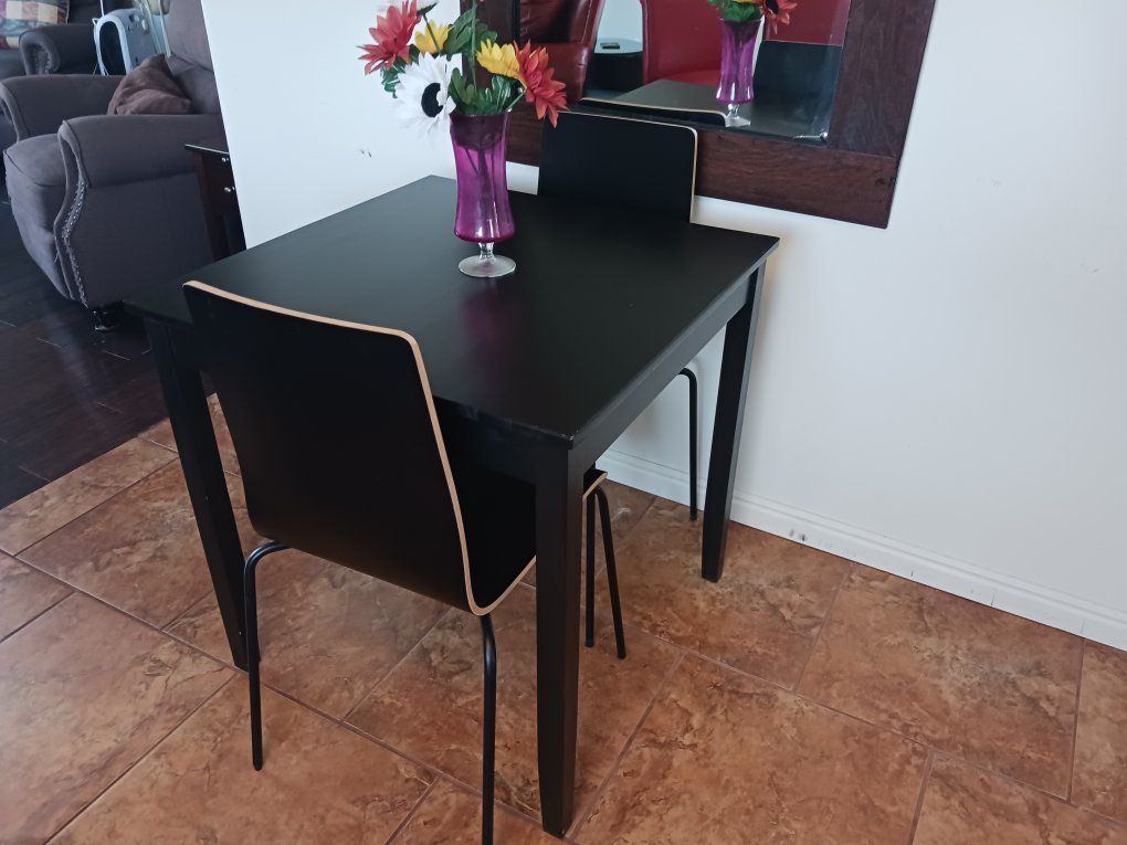 Table and two chairs