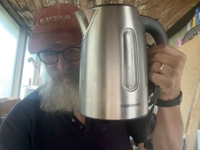 ELECTRIC TEA KETTLE WATER HEATER. BOILS WATER THEN TURNS OFF AUTOMATICALLY.
