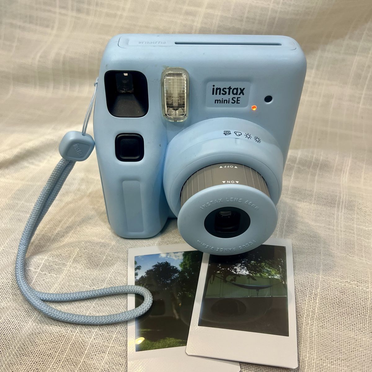 Fujifilm Instax Mini SE Instant Camera - Light Blue Point & Shoot with Wrist Strap