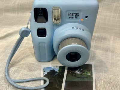Fujifilm Instax Mini SE Instant Camera - Light Blue Point & Shoot with Wrist Strap