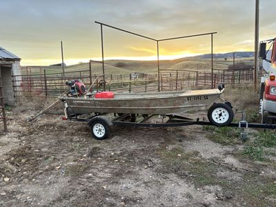 12 ft Jon boat with trailer and Honda motor
