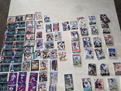 lot of 300+ football cards from 80s and 90s. over 90 rookie cards. inserts, hall of famers. good cond.
