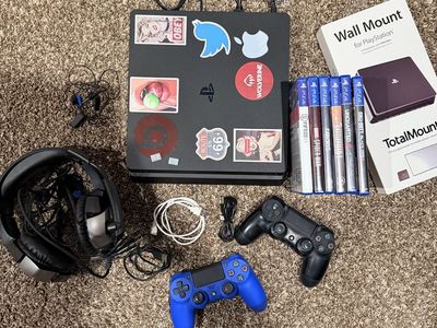 Sony PlayStation 4 (PS4) Slim Console Bundle w/ 2 Controllers, Games & Wall Mount