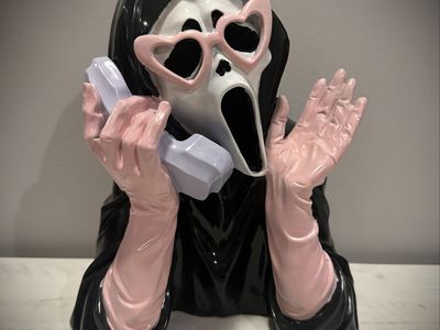 Halloween Pink Ghost Face Phone Figurine with Heart Sunglasses Lights Up and Plays Music